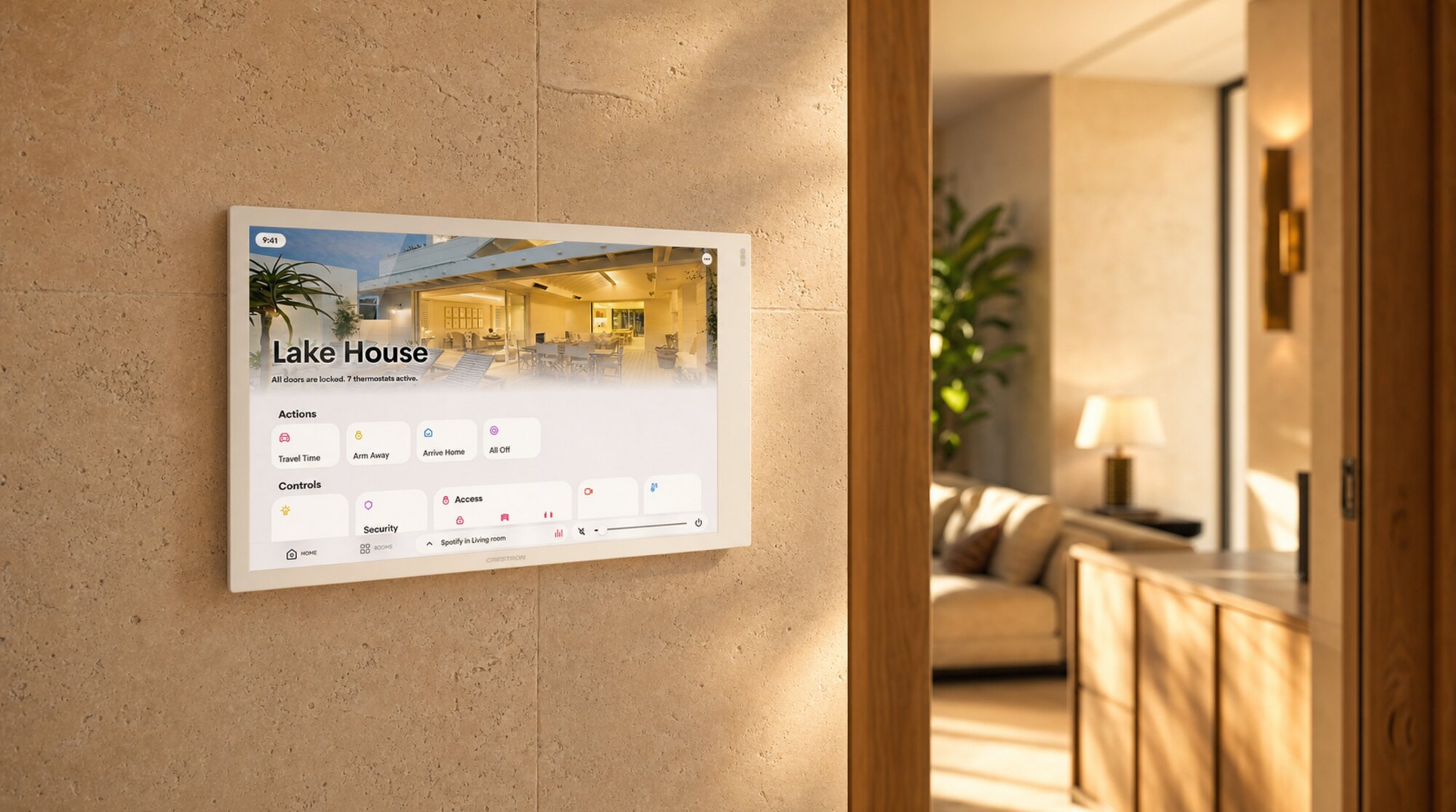 Black touch panel flush-mounted in a warm limestone wall